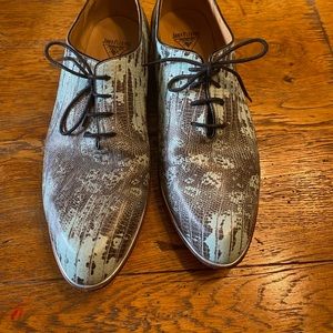 Green and black Fluevog shoes